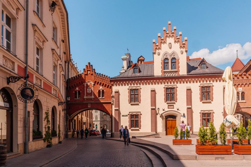 Building and archway in the square of Czartoryski Princes Alley in Krakow Poland