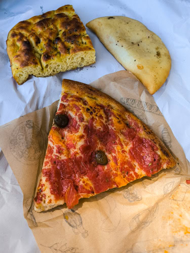 focaccia barese and two other baked goods in Bari