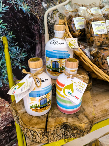 colorful olive oil bottles in Ostuni